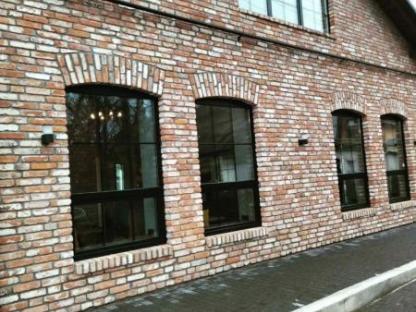 Облицовка фасадов домов старинным кирпичом, Брест